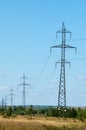 Detail of electricity pylon against blue sky Royalty Free Stock Photo