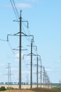 Detail of electricity pylon against blue sky Royalty Free Stock Photo