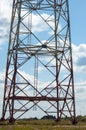 Detail of electricity pylon against blue sky Royalty Free Stock Photo