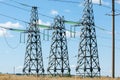 Detail of electricity pylon against blue sky Royalty Free Stock Photo