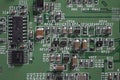 Detail of an electronic printed circuit board with many electrical components Royalty Free Stock Photo