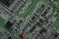 Detail of an electronic printed circuit board with many electrical components Royalty Free Stock Photo