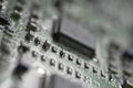 Detail of an electronic printed circuit board with many electrical components Royalty Free Stock Photo