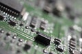 Detail of an electronic printed circuit board with many electrical components Royalty Free Stock Photo