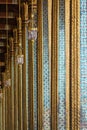 Detail of emerald Buddha temple columns in Bangkok, Thailand Royalty Free Stock Photo