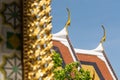 Detail of emerald Buddha temple roof on a sunny day in Bangkok, Thailand Royalty Free Stock Photo
