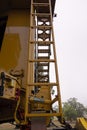 Detail of emergency exit ladders on huge mining dump truck