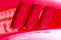 Detail engine air intake of a vintage red sports car Royalty Free Stock Photo