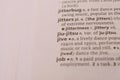 Detail Of English Dictionary Page And Word Pronunciation Of - jitters Royalty Free Stock Photo