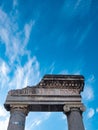 Detail of the entrance door of the ancient Greco-Roman amphitheater in Catania, on a background with blue sky Royalty Free Stock Photo