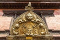 Detail of the entrance of an old Hindu temple at Durbar Square in Lalitpur, Patan, Kathmandu Valley, Nepal