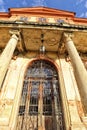 Detail of the entry door of the abandoned castle with ornamental bars