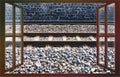 Detail of an european railway with metal train tracks over a roadbed stones - concept image iew from the window Royalty Free Stock Photo