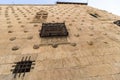 Detail of Facade of Casa de las Conchas with balcony in Salamanca, Spain, covered in scalloped shells, Community of Castile and Le