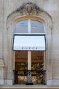 Detail of the facade of a Gucci boutique in the Champs-Elysees district in Paris, France