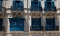 Detail of the facade of the historic Vincenzo Buceia Conservatory in Malta. You can see the typical blue balconies