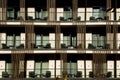 Detail of the facade of a modern multi-storey residential building or hotel with balconies. Royalty Free Stock Photo