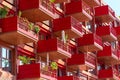 Detail of the facade of a red apartment house Royalty Free Stock Photo
