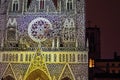 Detail of the facade of Saint-Jean Cathedral, Lyon - France, during the Festival of Lights 2022 Royalty Free Stock Photo