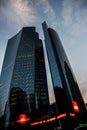 Facade of Shining Towers Abu Dhabi aginst cloudy sky