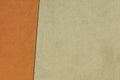 Detail Facade of two-tone plaster in beige and orange with an oblique black dividing line Royalty Free Stock Photo