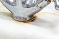 Detail of faucet with limescale or lime scale on it, dirty calcified and rusty kitchen mixer tap, close up