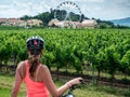 Detail of female cyclist looking at South MoraviaÃ¢â¬â¢s vineyards in Zajeci