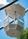 Detail of a ferris wheel cabin against blue sky Royalty Free Stock Photo