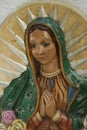 Close up to a figurine of the Virgin of Guadalupe Royalty Free Stock Photo