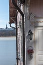 Detail of a Finnish wooden house on the background of the Helsinki skyline