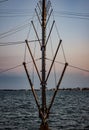 Detail of a fishing scale, a reinforced pole where one end of the net is tied, on the other side another pole.