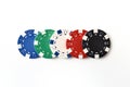 Detail of five different colored gambling game chips isolated white Royalty Free Stock Photo