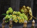 Detail of flowers and golden elephant at the temple of the sacred tooth relic