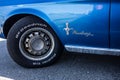 Detail of a 1968 Ford Mustang convertible classic blue pony car