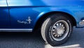 Detail of a 1968 Ford Mustang convertible classic pony car, rare blue color