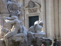 Fountain of the four rivers with the snow to Rome in Italy.