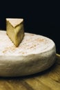 French Le Marcaire cheese on the wooden table
