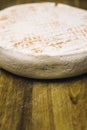 French Le Marcaire cheese on the wooden table