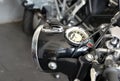 Detail of front light and speedometer of old motorbike Royalty Free Stock Photo
