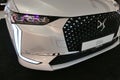 Detail of front mask of modern french compact electric car DS 4 Crossback E-Tense Royalty Free Stock Photo