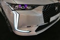 Detail of front mask of modern french compact electric car DS 4 Crossback E-Tense