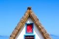 Detail of the front side facade of the traditional house in Santana, Madeira Island, Portugal. Typical thatched roof, colorful