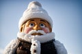 Detail of a frost-covered garden gnome