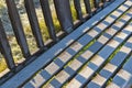 Detail of frosty garden bench in autumn park landscape Royalty Free Stock Photo