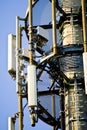 Detail of a 3G, 4G LTE transmitter tower against clear blue sky Royalty Free Stock Photo
