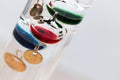 Detail of a galileo thermometer with white background Royalty Free Stock Photo