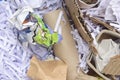 Detail of garbage with cardboard, shredded paper and paper