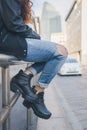 Detail of a girl posing in an urban context Royalty Free Stock Photo