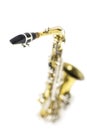 Detail of an isolated in white portrait of an alto saxophone Royalty Free Stock Photo