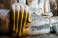 Golden hand of Phra Achana, Buddha statue at Wat Si Chum in Sukhothai, Thailand Royalty Free Stock Photo